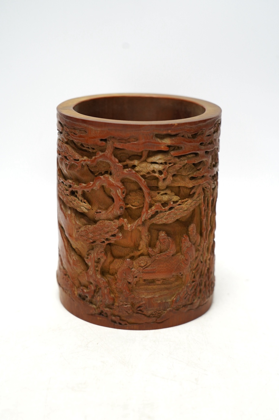 A Chinese carved bamboo 'scholars' brushpot, 15.5cm tall. Condition - fair to good